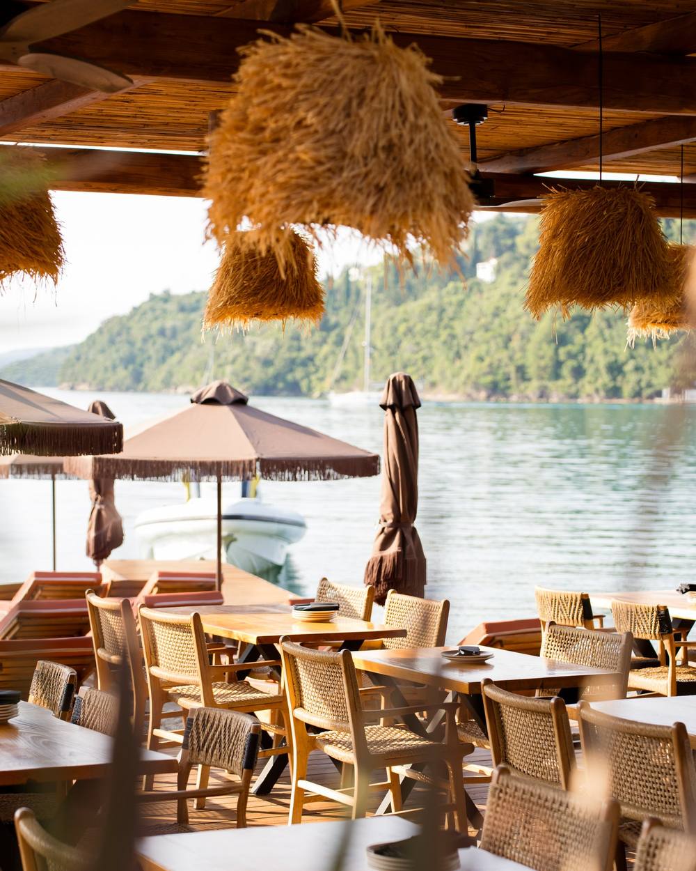 Beach bar restaurant terrace overlooking the sea, restaurant photography in Lefkada