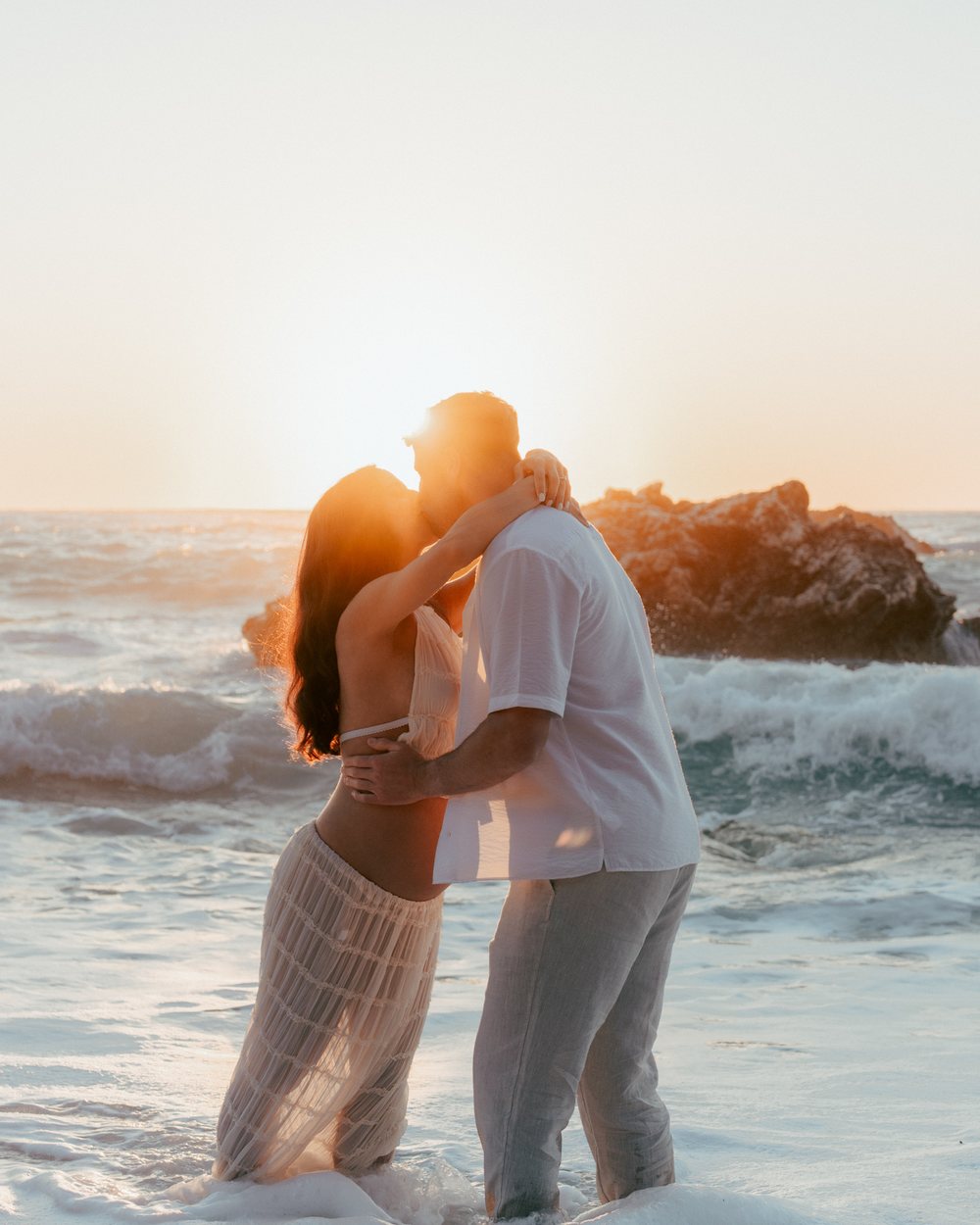 Couple embracing at golden hour on a Lefkada beach