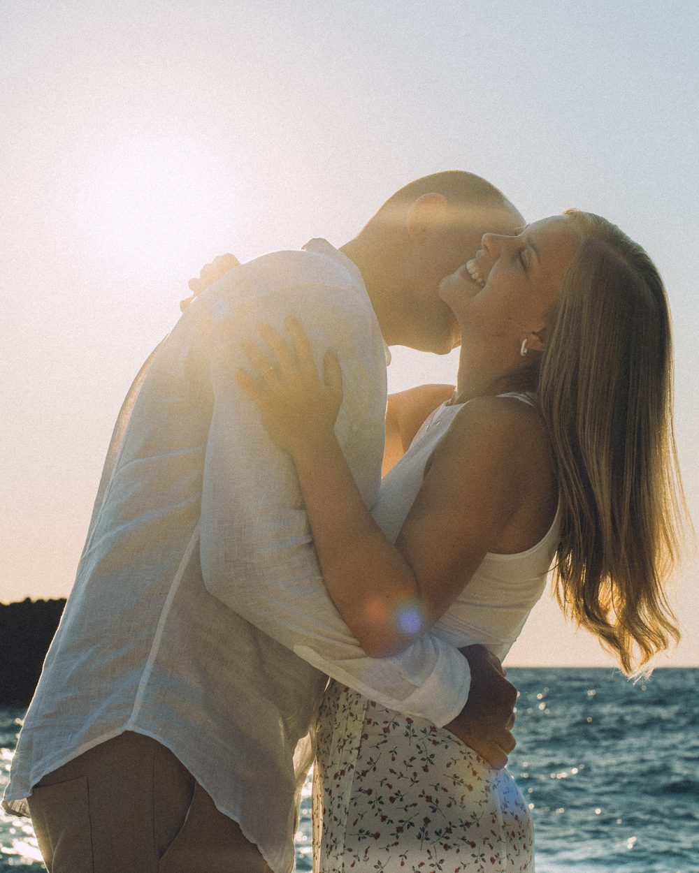 Couple embracing at sunset in Lefkada